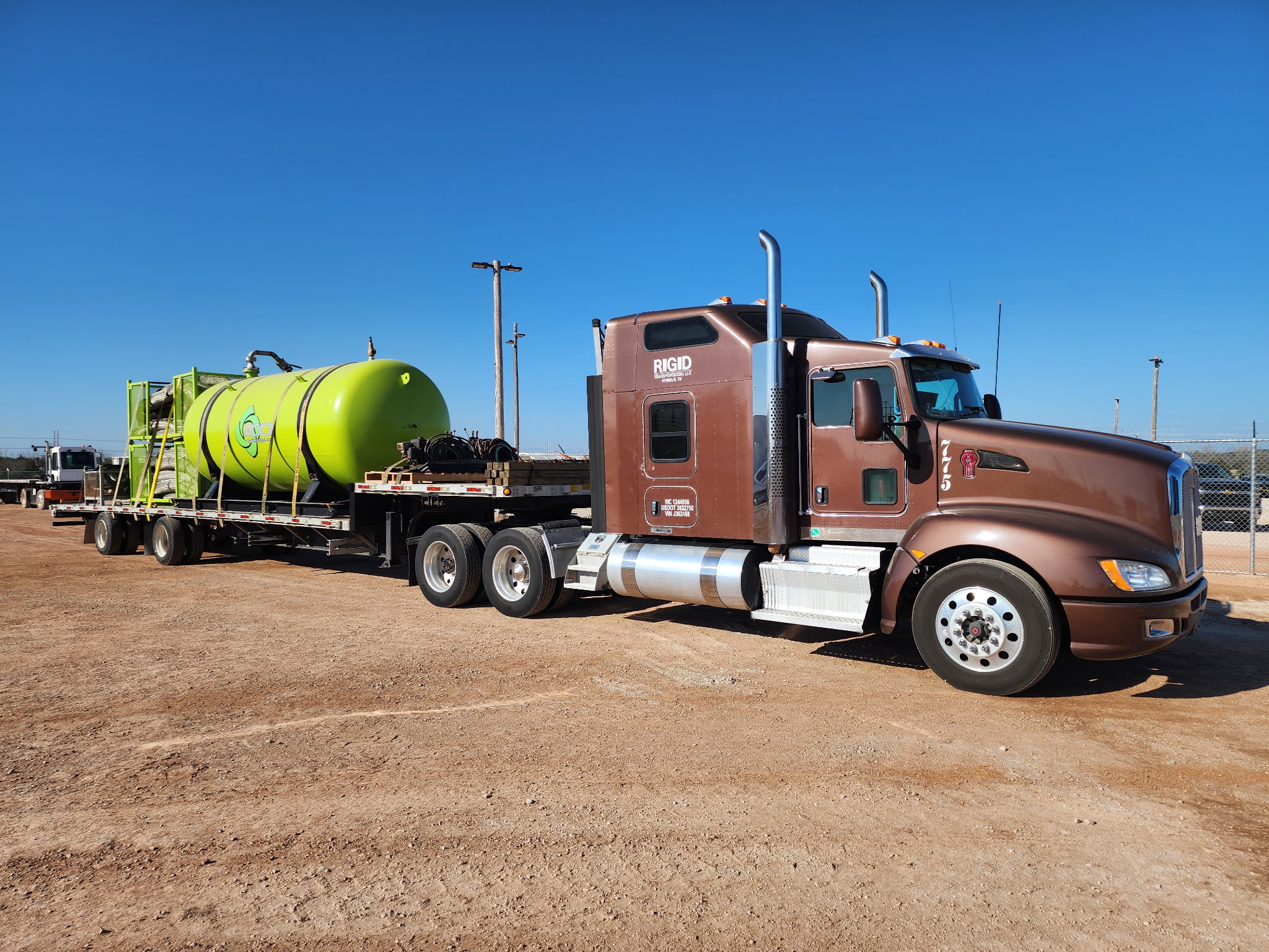 RIGID flatbed freight load at night