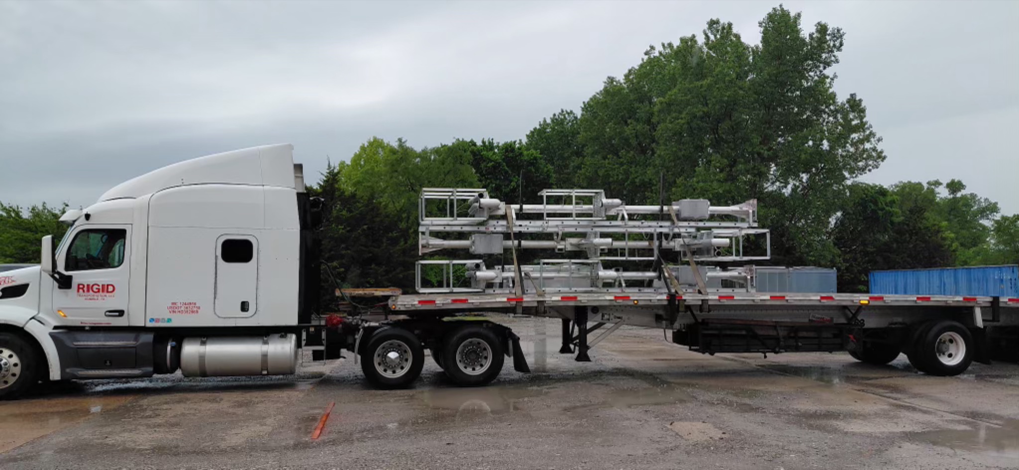 RIGID flatbed truck hauling freight